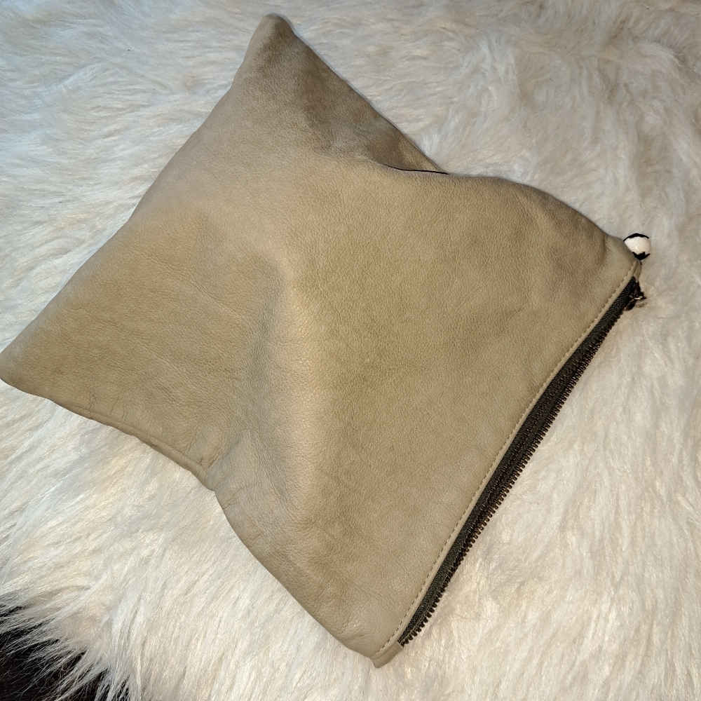 C. Blau Vintage Clutch Numbered 0070. Gold tone name plate and Bead Zip. Leather